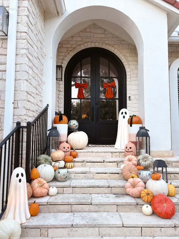 Halloween front porch of a white stone house
